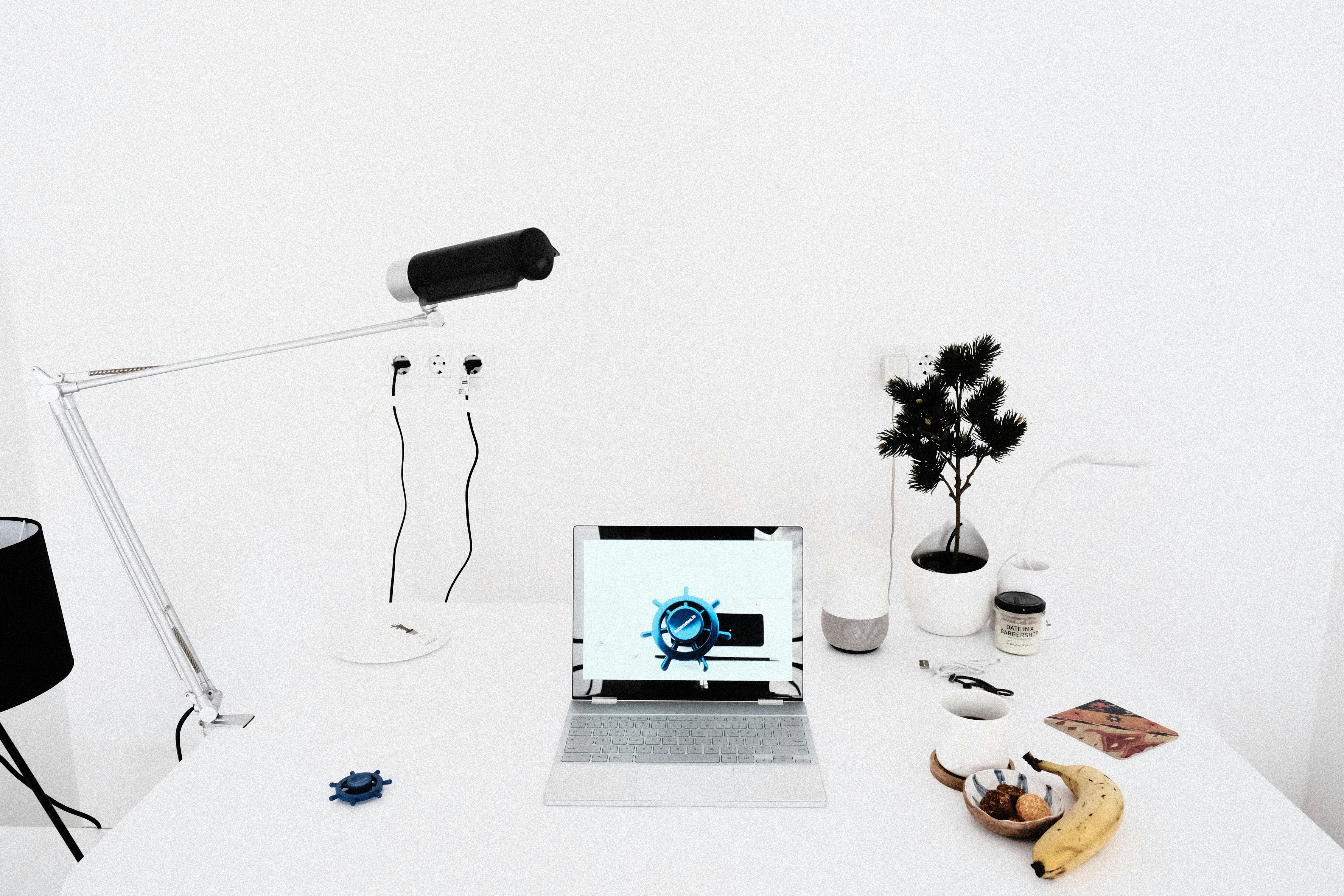 Picture of a laptop featuring a helm. Photo by Ihor Dvoretskyi/Unsplash
