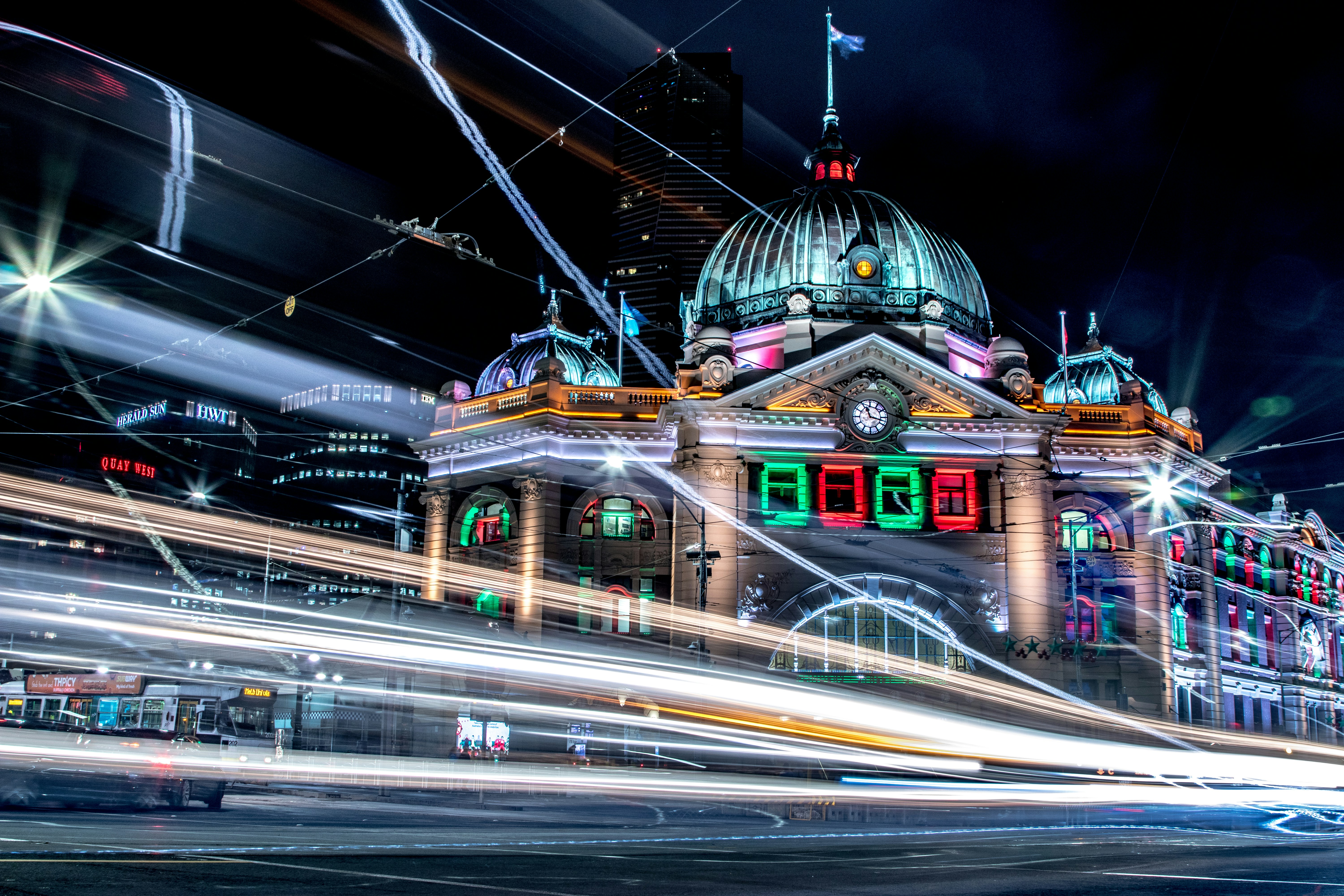 The iconic Finders Street Station in Melbourne, Victoria, Australia at night. ©2018 Matt Zhang, Unsplash license.